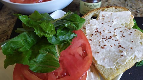 Open faced tomato salad sandwich
