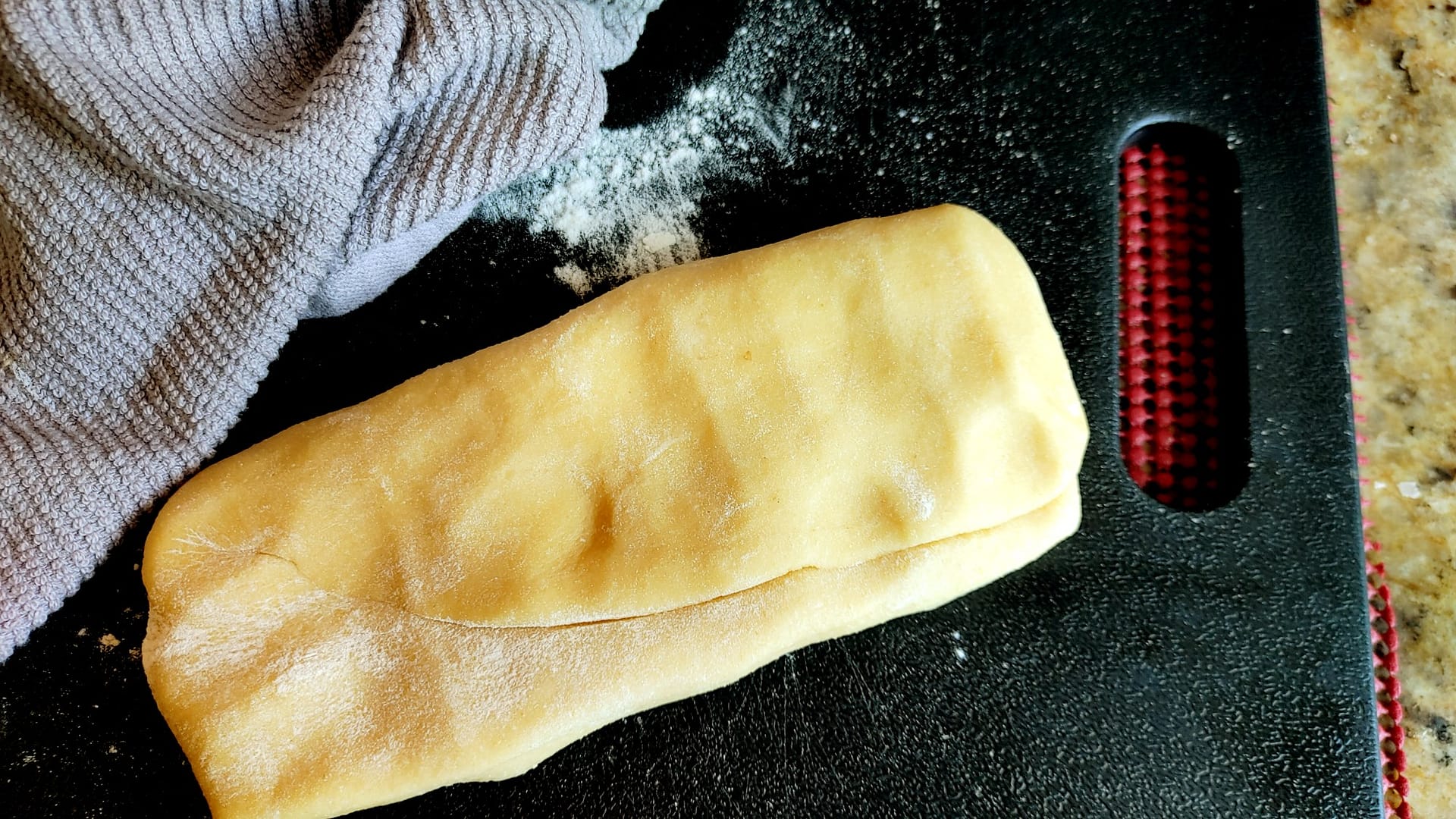 Rolling out goat cheese and peas ravioli with KitchenAid R…