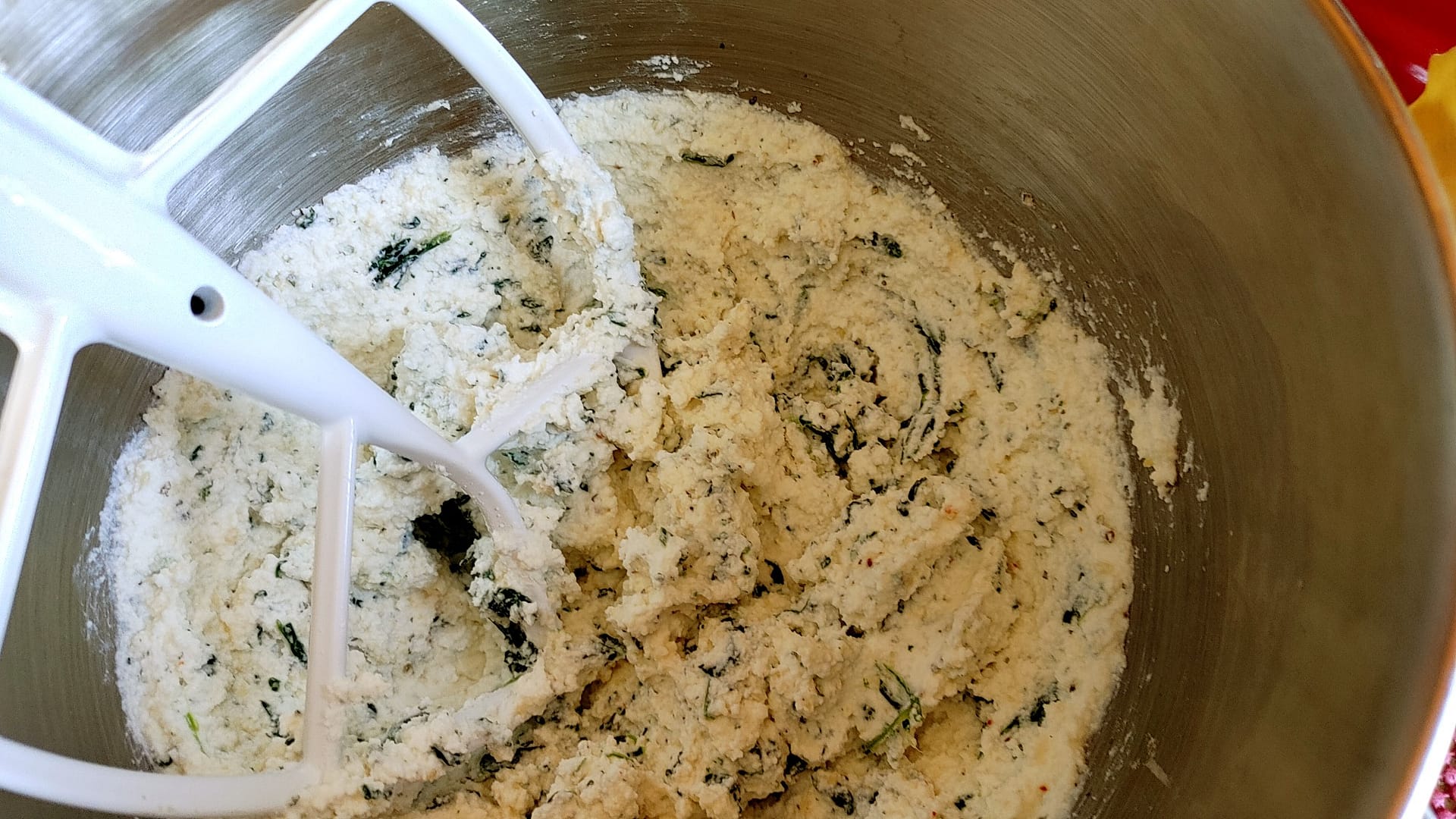Making ravioli, More ravioli coming out of the KitchenAid r…