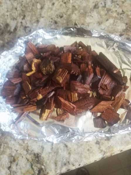 Wood chips soaked for barbecue on the stovetop